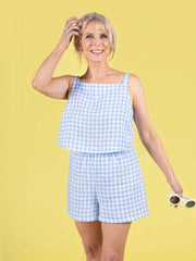 Model wearing a summery matching gingham shorts and top set, made using the Esti co-ord sewing pattern