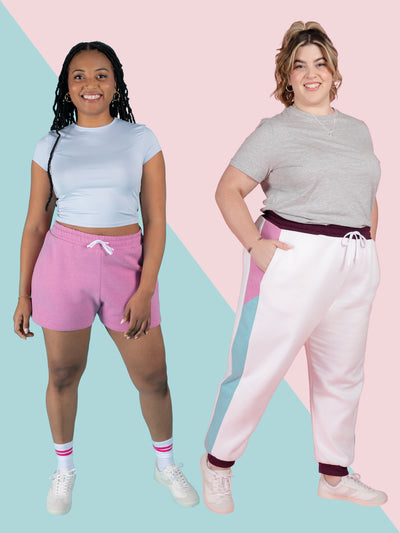 Two models wearing the Tilly and the Buttons joggers and sweat shorts. One model features the colour block version, while the other showcases the solid colour option, highlighting the versatility of this joggers + shorts sewing pattern.