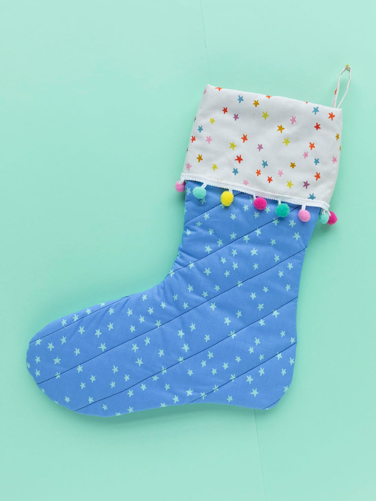 Easy Christmas stocking sewing pattern for beginners with lining, cuff, hanging loop