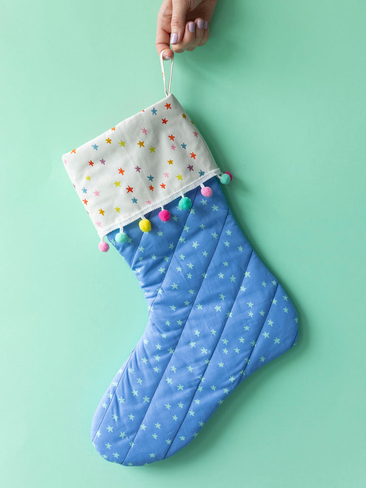 Easy Christmas stocking sewing pattern for beginners with lining, cuff, hanging loop