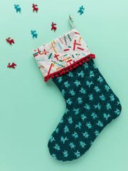 Easy Christmas stocking sewing pattern for beginners with lining, cuff, hanging loop