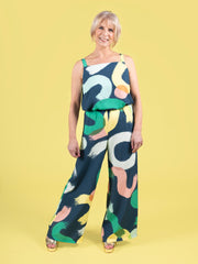 Model wearing a faux jumpsuit in a bold brushstroke print. The look was created with a matching top and trouser set, made using the Esti co-ord sewing pattern.
