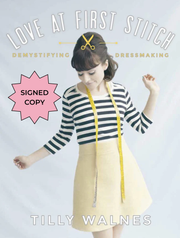 Book cover of 'Love at First Stitch' by Tilly Walnes with Tilly modelling the Delphine skirt with a measuring tape around her neck.
