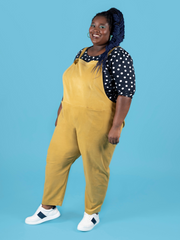 Curvy, plus size model wearing long dungarees or overalls handmade using the Erin sewing pattern