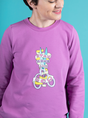  Tilly Walnes wears an orchid colour Billie sweatshirt with 'Stay Home and Sew' scissors transfer, made using Tilly and the Buttons' Billie sweatshirt kits.